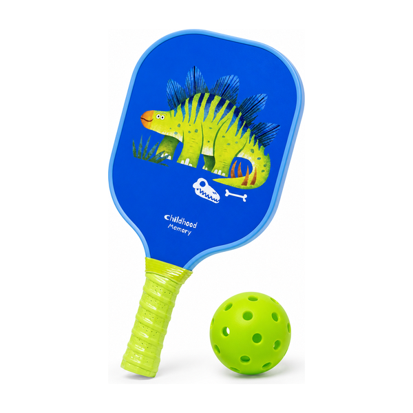 Kids pickleball paddle with a blue dinosaur design and green grip next to a green ball