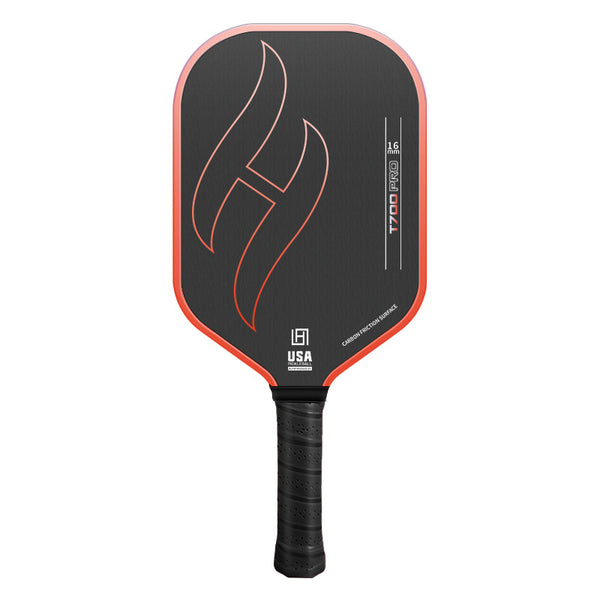 T700 Pro carbon fiber pickleball paddle in gradient orange — black 16mm carbon friction face with flame graphic and black grip, front view