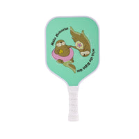 Kids pickleball paddle with a mint green otter design and white grip