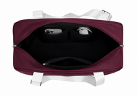 Interior of the red wine pickleball tote bag with two slip pockets and an internal zip pocket