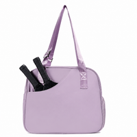 Lavender pickleball tote bag with an angled front paddle pocket and adjustable strap
