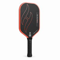 T700 Pro carbon fiber pickleball paddle — close-up of the black carbon friction face, flame graphic and 16mm gradient edge