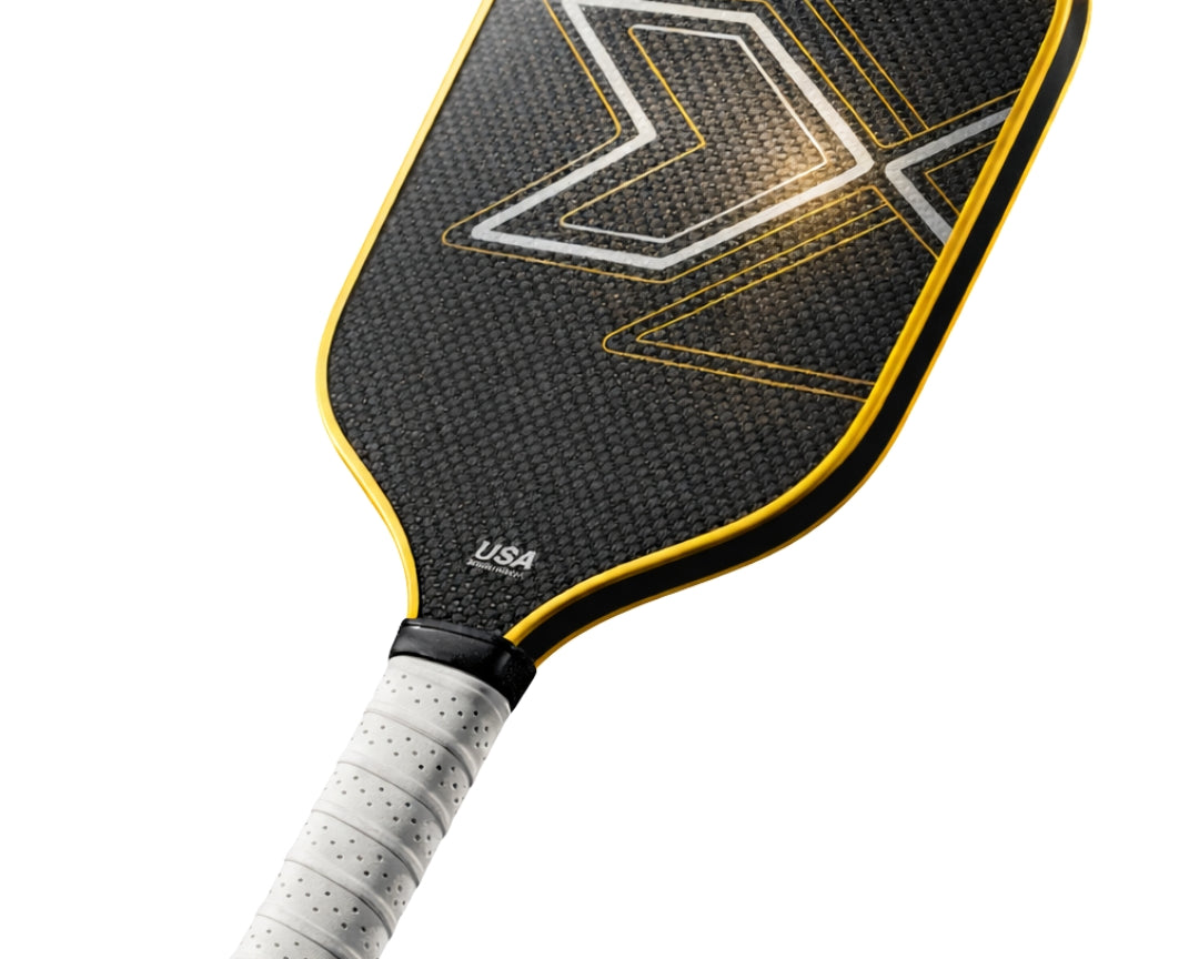 PickleballDoor titanium weave carbon fiber pickleball paddle in gold, 16mm core, USA Pickleball approved, white cushion grip, front view