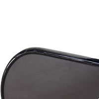 Pickleball paddle with edge guard tape installed, side profile view