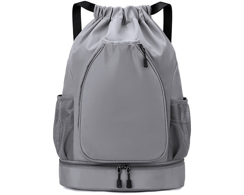 Grey pickleball racket bag with backpack and shoulder strap options, ideal for daily court visits and travel