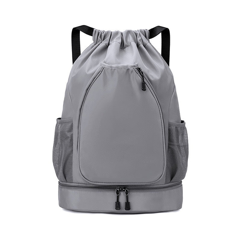 Grey pickleball racket bag with backpack and shoulder strap options, ideal for daily court visits and travel