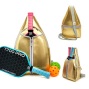 Gold neoprene pickleball sling bag with honeycomb texture and adjustable crossbody strap shown with paddle and pickleball