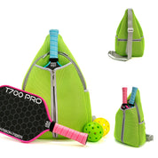 Green neoprene pickleball sling bag with honeycomb texture front panel and adjustable crossbody strap shown with paddle and balls