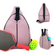 Purple neoprene pickleball sling bag with honeycomb texture front panel, front zipper pocket and adjustable crossbody strap shown with paddle and balls