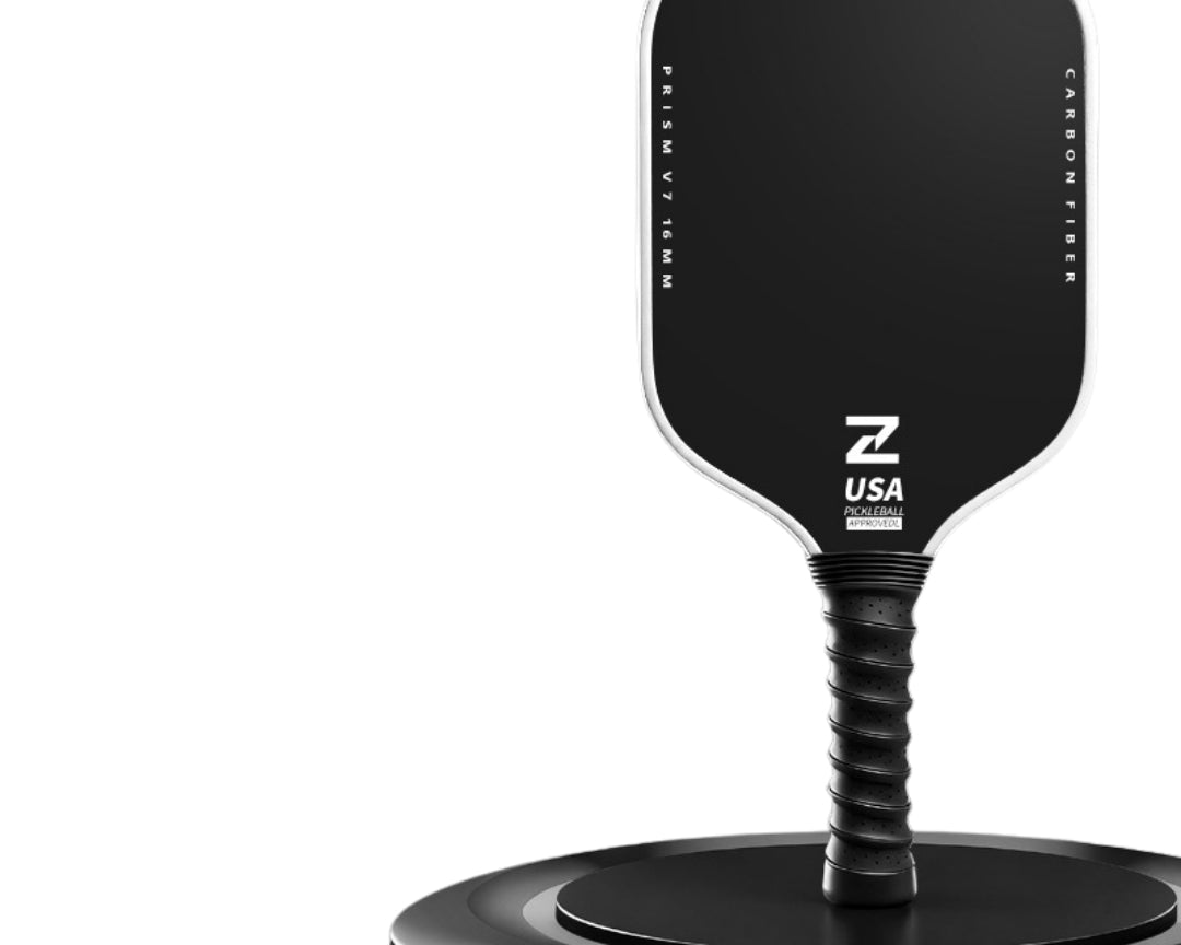 Prism V7 carbon fiber pickleball paddle in white with T700 matte friction surface, TPU edge guard and shock-absorbing ribbed grip