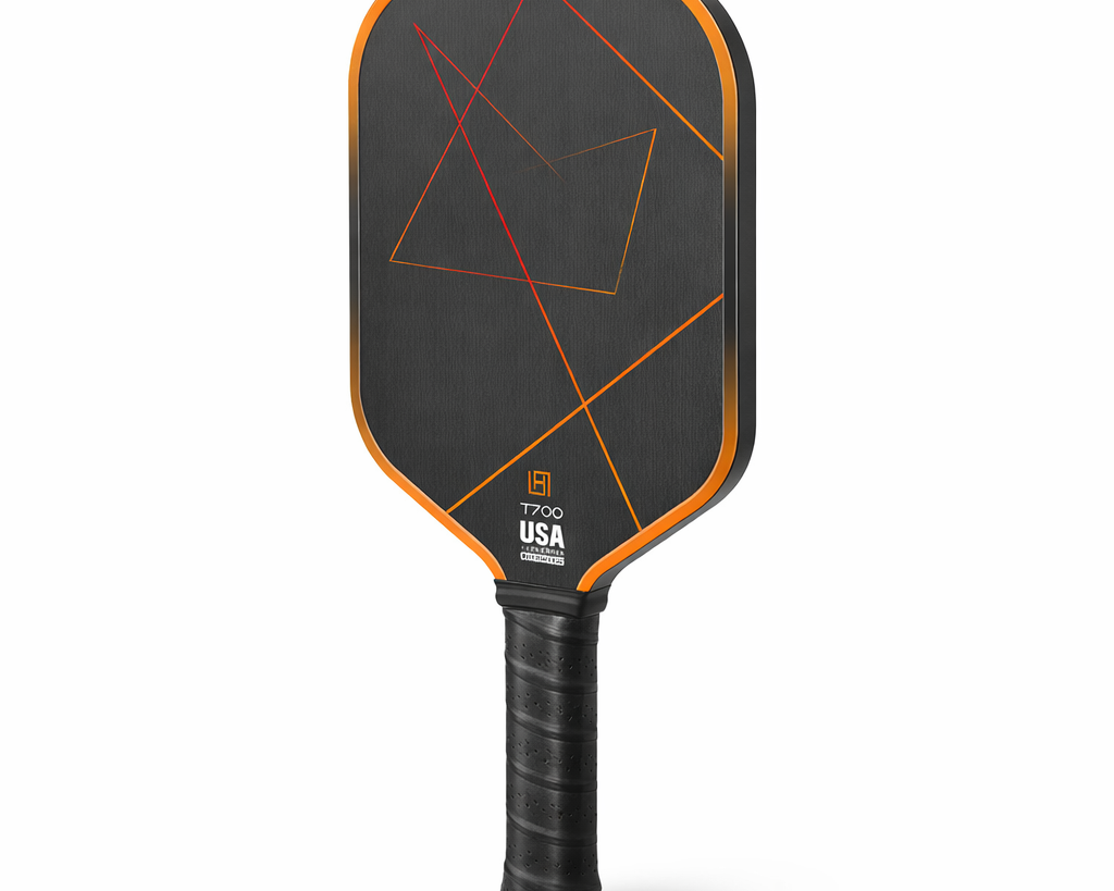 orange carbon fiber pickleball paddle with gradient orange geometric lines and orange edge guard, T700 surface