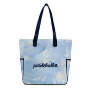 Flat lay of women's pickleball bag showing quilted paddle protection, zipper compartments, and neoprene detailing