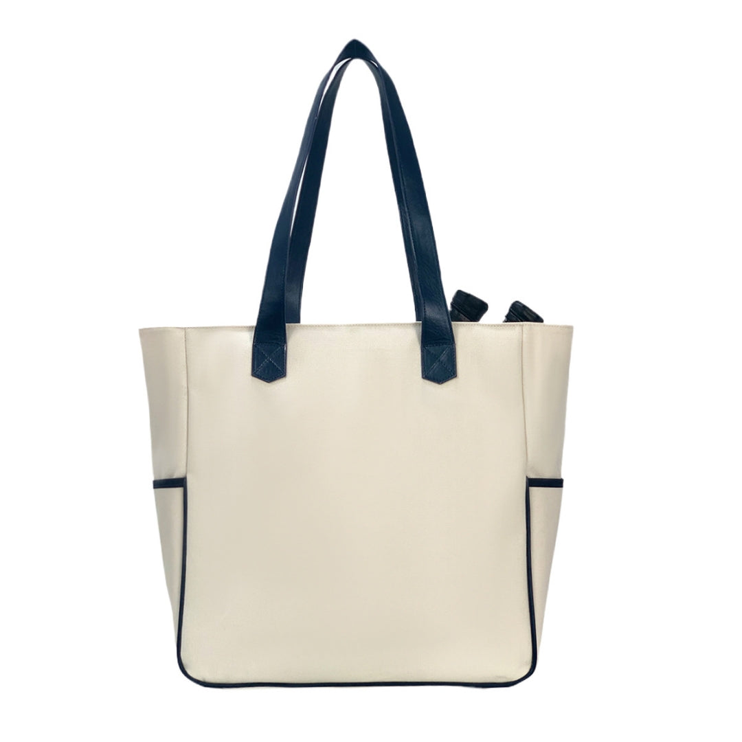 Women's pickleball bag shown as a stylish backpack, perfect for carrying gear from office to court