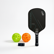 Black pickleball paddle set with 2 balls and grip protection tape front view