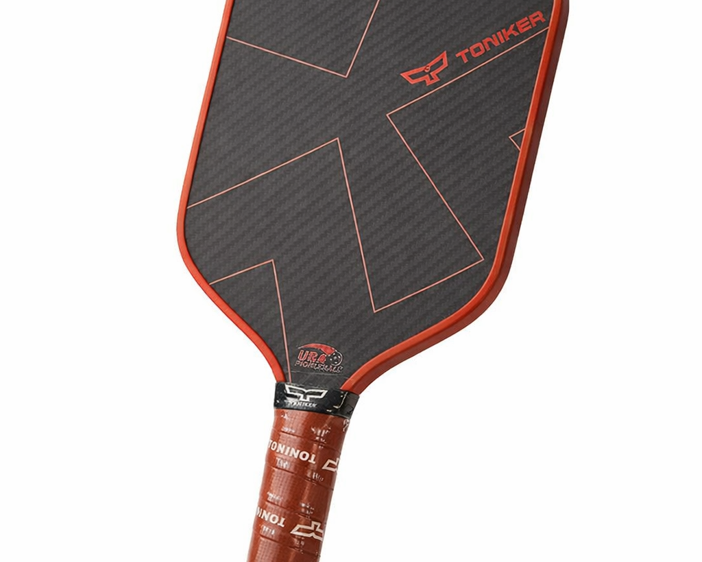 Orange kevlar pickleball paddle PickleballDoor side profile view