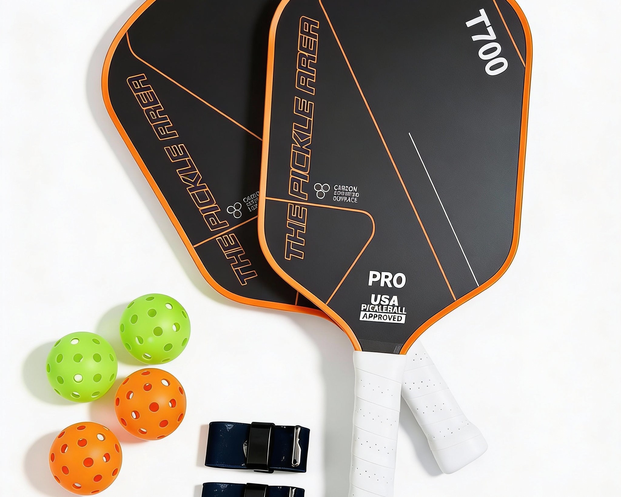 Orange pickleball paddle set of 2 with complete accessories for doubles play top view