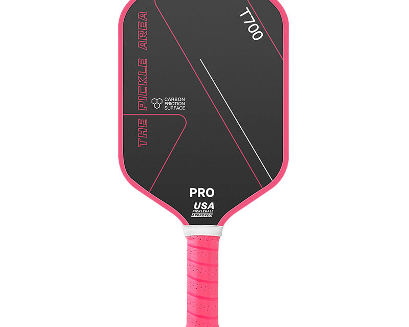 Pink pickleball paddle showing carbon fiber face and ergonomic handle design